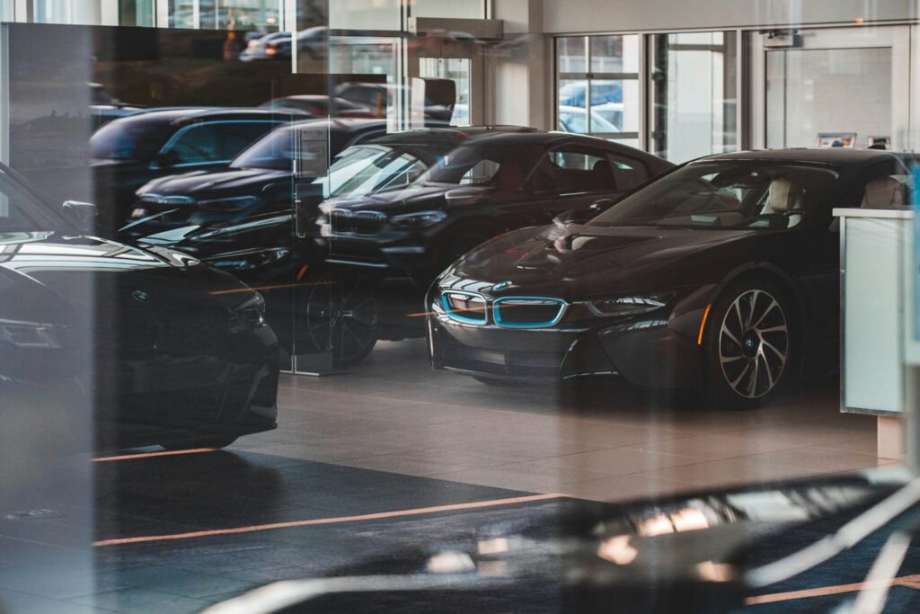 buying-a-car-with-credit-card Looking inside a dealership ready to buy a car with a credit card.